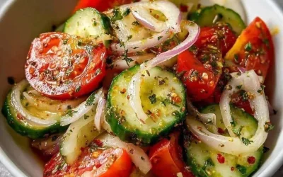 Delicious and Refreshing Marinated Cucumber, Onion, and Tomato Salad